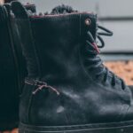 Boots - Pair of Black Lace-up Boots on Area Rug