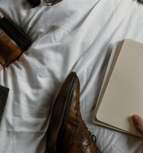 Loafers - Person Holding White Tablet Computer