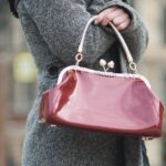 Coat - Selective Focus Photography Woman Wearing Gray Coat Standing Near Building