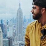 Jacket - Portrait Photo of Man in Yellow Zip-up Jacket Near Empire State Building