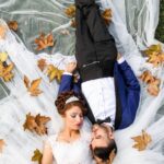 Gown - Aerial Photo of Man and Woman Lying on Grass Field