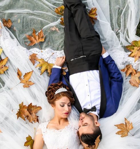 Gown - Aerial Photo of Man and Woman Lying on Grass Field