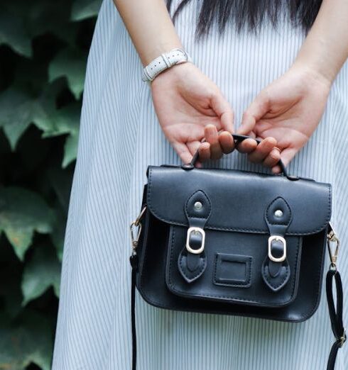 Handbag - Woman Holding Black Leather Bag