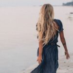 Dress - Back View of a Woman Walking on the Seashore