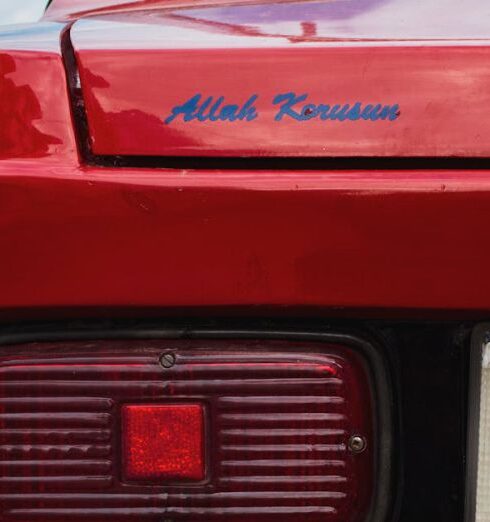 Jackets - A red car with a license plate on the back