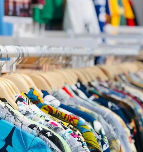 Shirts - Shallow Focus Photo of Clothing Rack