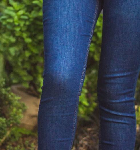 Jeans - Woman Standing on Brown Pathway