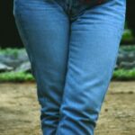 Jeans - Woman Holding Her Jeans