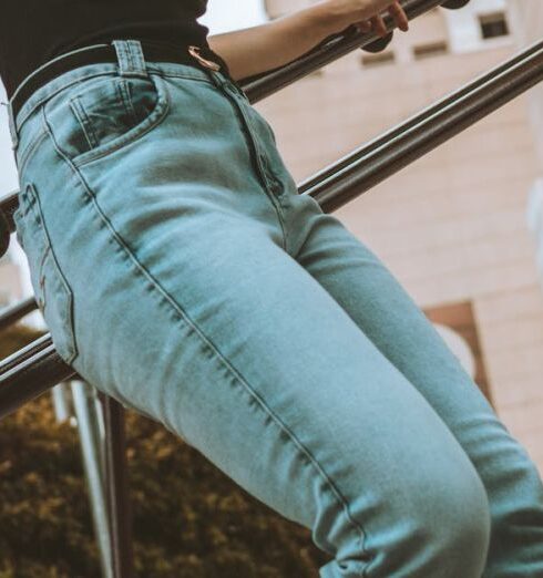 Jeans - Woman Leaning on Railing