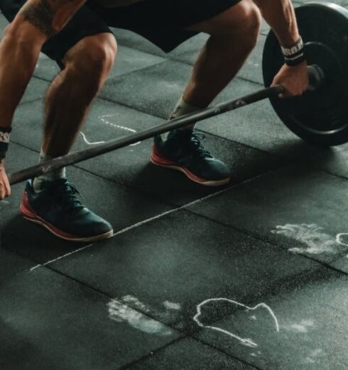 Workout - Man About to Lift Barbell