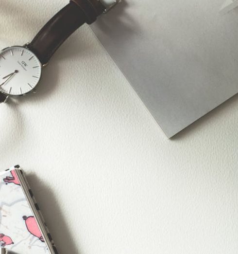 Accessories - Brown Mug Near Watch and Flower on White Surface