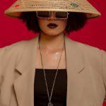 Fashion Trends - Photo of a Fashionable Woman Wearing a Conical Hat