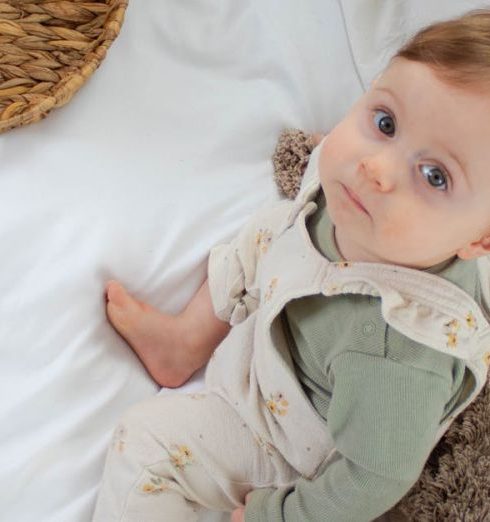 Organic Bedding - Little Child Sitting on Sofa