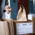 Home Goods Stores - Woman Unpacking a Shopping Bag