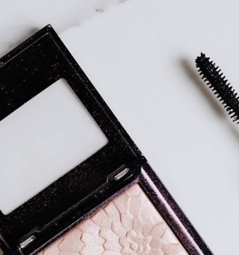 Beauty Product Outlets - A Highlighter Beside a Mascara