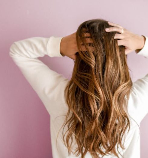 Hair Care - Woman Wearing White Long-sleeved Shirt