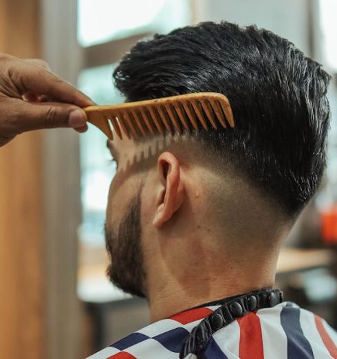 Grooming Products - Man Sitting on Barber Chair