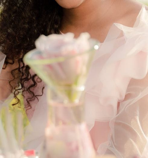 Fragrances - Smiling Woman Sitting at Table and Creating Flavours and Fragrances