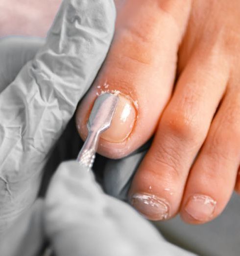 Nail Care - Close-up of Woman Doing Pedicure