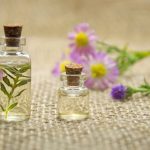 Essential Oils - Two Clear Glass Bottles With Liquids