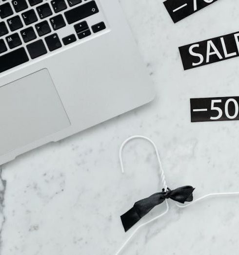 Electronics Deals - Black and Silver Laptop Computer on a Marble Surface