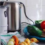 Home Appliances - Photo of Vegetables Beside Gray Electric Kettle