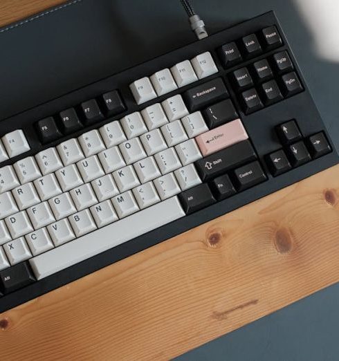 Computer Accessories - A Modern Keyboard on a Desk