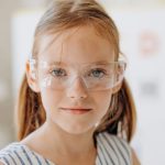 Back-to-School - Portrait of a Young Girl Wearing Safety Glasses