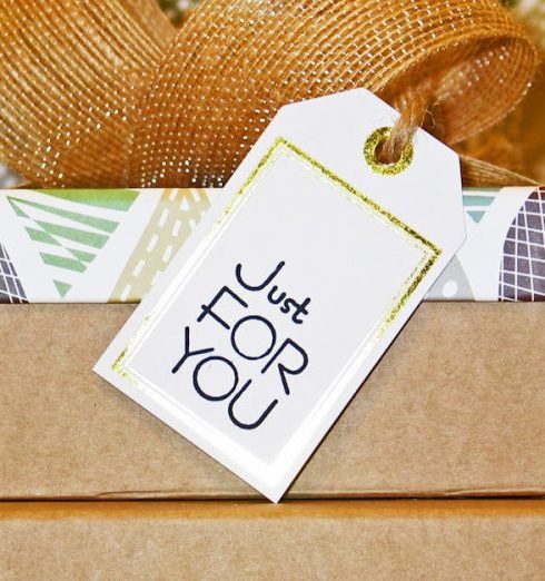 Gifts - Close-up Photo of Gift Boxes with Greeting Card