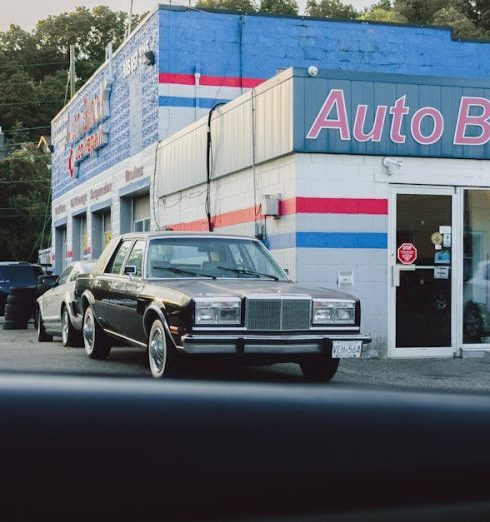 Repair Services - Auto Repair Shop Behind Car Window