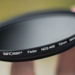 Outdoor Gear Brands - Close-up of a Person Holding a Camera Lens Filter