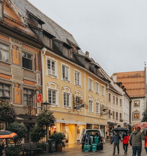 Boutiques - Pedestrians in Alley in Fussen, Germany