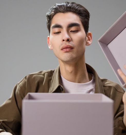 Unique Gifts - A Man Opening a Box