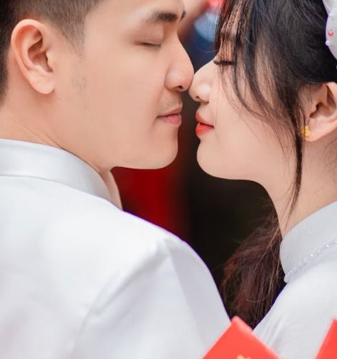 Couples' Gifts - Newlywed in Traditional White Ao Dai Tunics Standing Face to Face