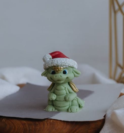 Art Gifts - Santa Hat on Toy Dragon