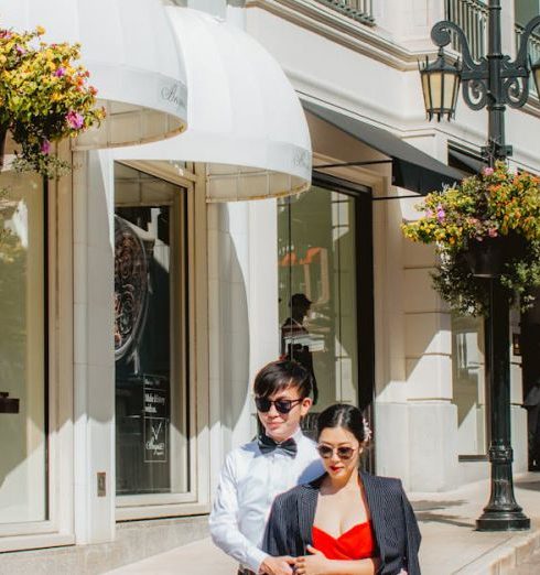 Fashion Boutiques - Woman in Red Dress in City