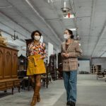 Resale Shops - Two Women wearing Face Mask Walking Together