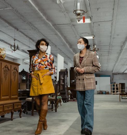 Resale Shops - Two Women wearing Face Mask Walking Together