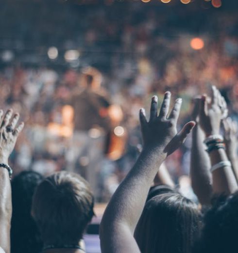 Events - Group of People Raise Their Hands on Stadium