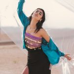 Sustainable Fashion - Woman Posing with Foil on Desert