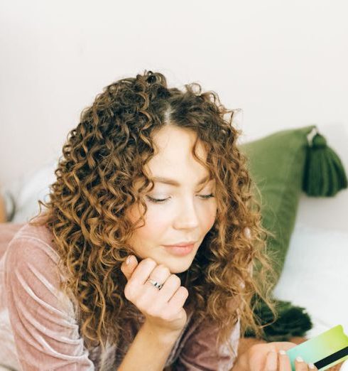 Online Shopping - Woman in Pink Dress Lying on Bed