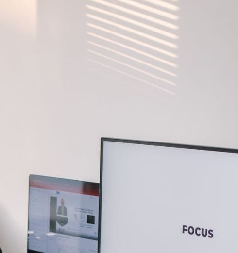 Tech Gadgets - Computer Monitor on a Desk in an Office