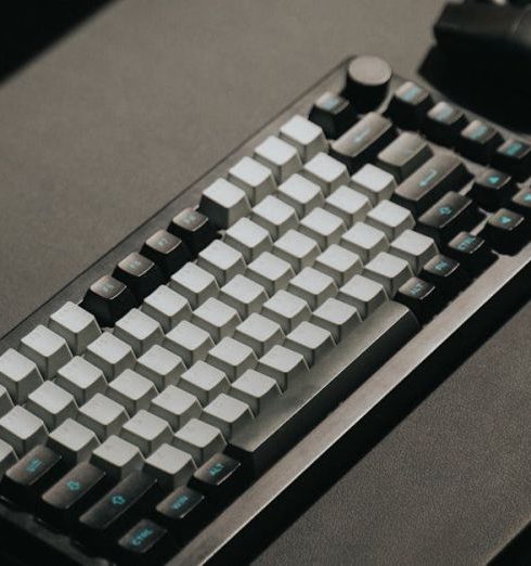 Gaming Accessories - Wireless Mouse and Mechanical Gaming Keyboard on the Desk