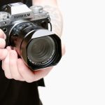 Photography Gadgets - Man Holding a Camera