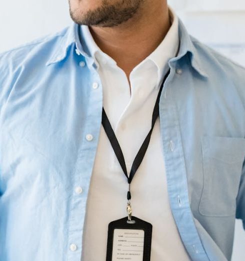 Office Gadgets - Office Workers with a Document Folder and a Badge