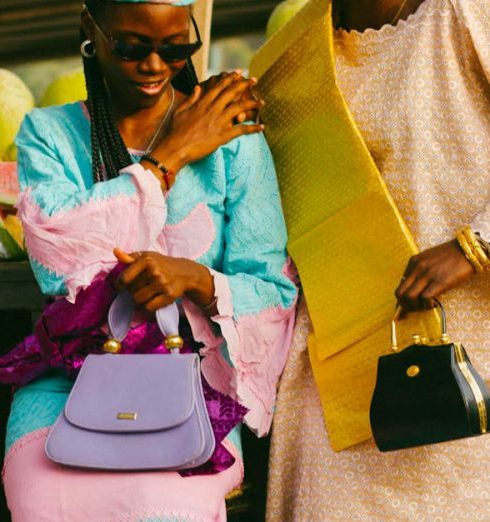 Hats And Bags - Smiling Women in Traditional Clothing