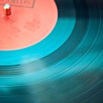 Vinyl Records - Blue Vinyl Record Playing on Turntable