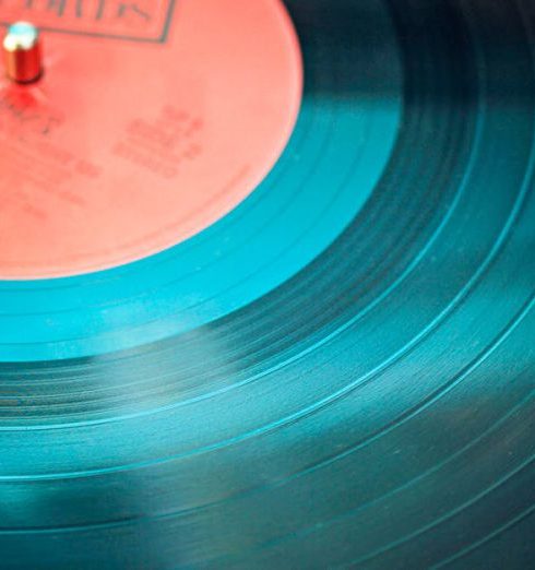 Vinyl Records - Blue Vinyl Record Playing on Turntable