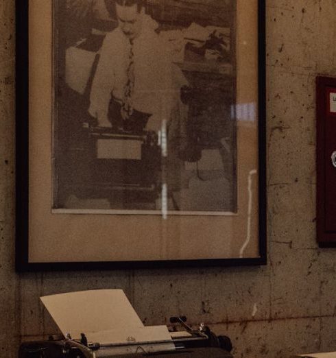 Vintage Typewriters - Vintage Picture on Wall over Typewriters Exhibition