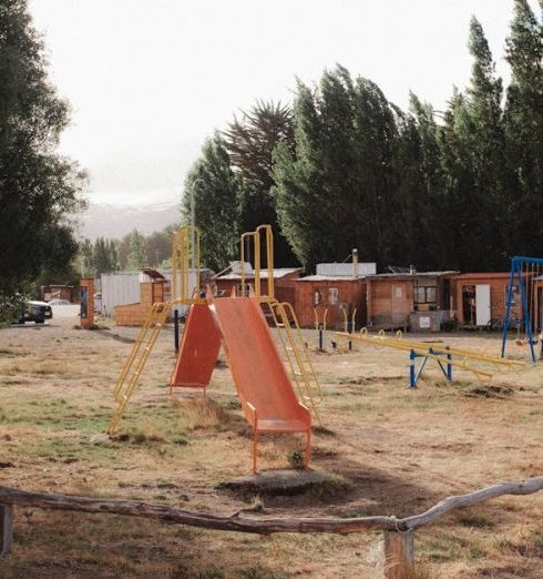 Family-Friendly Malls - Playground Among Camping Buildings